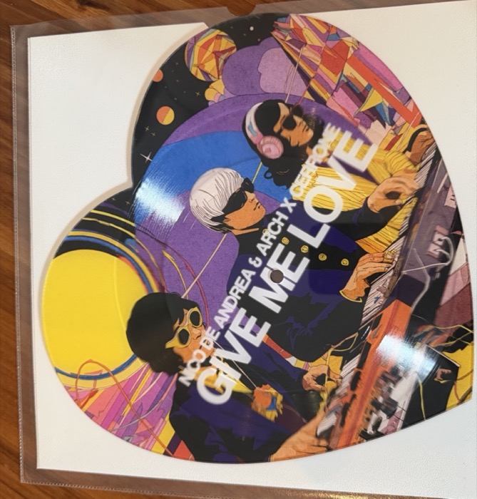 Heart-shaped Give Me Love picture disc